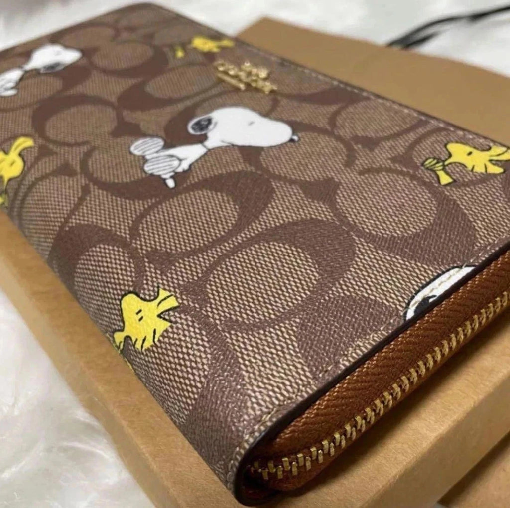 Women's Long Zip-Around Wallet – Khaki Signature Canvas with Snoopy & Woodstock Print  COACH x Peanuts CE705