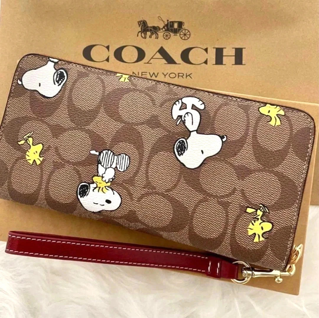 Women's Long Zip-Around Wallet – Khaki Signature Canvas with Snoopy & Woodstock Print  COACH x Peanuts CE705