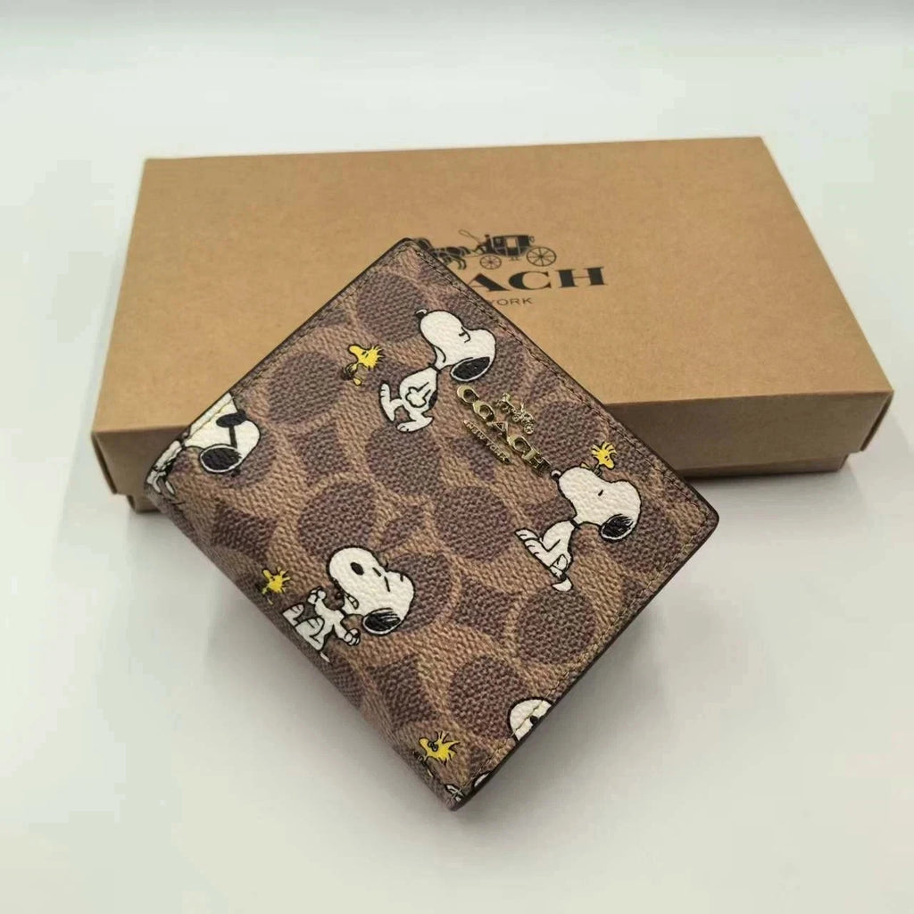 Women's Snap Wallet – Signature Canvas with Snoopy Character Print, Compact Card & Cash Organizer | COACH x Peanuts CBN32