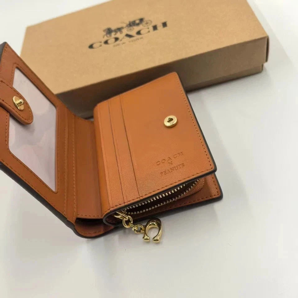 Women's Snap Wallet – Signature Canvas with Snoopy Character Print, Compact Card & Cash Organizer | COACH x Peanuts CBN32