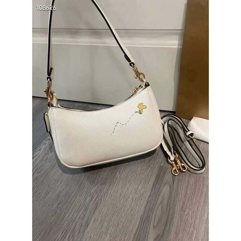 Women's Teri Shoulder & Crossbody Bag – Peanuts Snoopy Character Design, Compact Everyday Handbag | COACH CBJ76