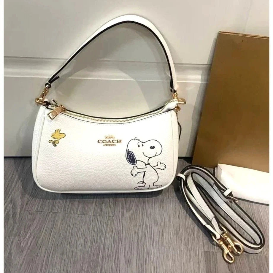 Women's Teri Shoulder & Crossbody Bag – Peanuts Snoopy Character Design, Compact Everyday Handbag | COACH CBJ76